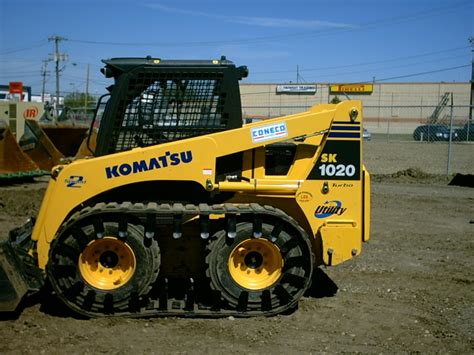 track conversion for skid steer|tracks for wheeled skid steers.